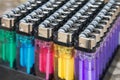 Multicolored gas lighter in package for sale.plastic gas lighter closeup Royalty Free Stock Photo