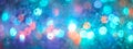 Multicolored glitter bokeh lights garland, border. Defocus background beautiful pastel colors, turquoise, blue, pink. Holiday Royalty Free Stock Photo