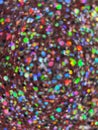 Multicolored glitter. Close-up on a glitter surface.