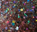 Multicolored glitter. Close-up on a glitter surface.