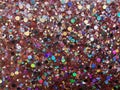 Multicolored glitter. Close-up on a glitter surface.