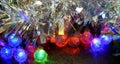 Multicolored glowing Christmas balls garlands close-up