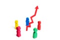A multicolored group of people stands around the arrow up. Concept of business success. Increase sales and ranking, improve qualit Royalty Free Stock Photo