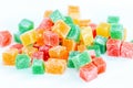 Multicolored gummies lying on a white background Royalty Free Stock Photo