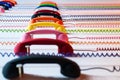 Multicolored handsets with spiral wire on a white background