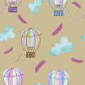 Multicolored hot air balloons, clouds, and feathers on beige background. Seamless pattern. Travel, postcard, kids print, packaging Royalty Free Stock Photo