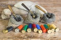 Multicolored hunting cartridges and many different bags with lead fractions and measure tools on old wooden background Royalty Free Stock Photo
