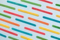 Multicolored ice cream sticks texture on blue background. Royalty Free Stock Photo