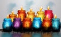 Multicolored Illuminated Jar Candles Decorated