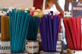 Multicolored incense sticks on sale in store, religious aromatic stick.