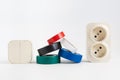 multicolored insulating tape,double socket,two-key light switch.white background