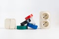 multicolored insulating tape,double socket,two-key light switch.white background