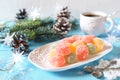 Multicolored jelly candy, cup of coffee, New Year dessert