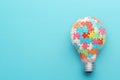 Autism Awareness Puzzle Light Bulb Creative. Royalty Free Stock Photo