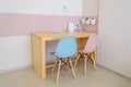 Multicolored Kids Table and Chairs Wooden Furniture Set. Special Education Study Place in an Occupational Therapy Classroom