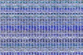 Multicolored knitted fabric background texture. ÃÂ¡olorful blue fabric with a pattern. Fragment colored wool carpet, bright wicker Royalty Free Stock Photo