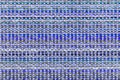 Multicolored knitted fabric background texture. ÃÂ¡olorful blue fabric with a pattern. Fragment colored wool carpet, bright wicker Royalty Free Stock Photo