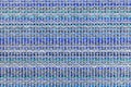 Multicolored knitted fabric background texture. ÃÂ¡olorful blue fabric with a pattern. Fragment colored wool carpet, bright wicker Royalty Free Stock Photo