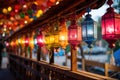 multicolored lanterns hung on metal poles