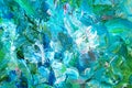 Multicolored large strokes of oil paint in blue, gteen shades on canvas, close up. Creative conception of abstract and Royalty Free Stock Photo