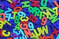 Multicolored letters and numbers on a blue background