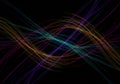 Multicolored light trails create a dynamic, abstract pattern against a Royalty Free Stock Photo