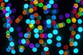 The multicolored lighting for New year greetings. Royalty Free Stock Photo