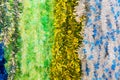 Multicolored Lush Shiny Christmas Tinsel. Background Festive Picture. Full Screen Photo
