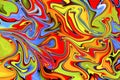 Multicolored marbling paint swirls background.