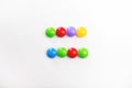 A multicolored mathematical signs made of children`s toys