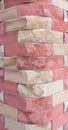 Multicolored modern brick column with red, close-up, texture