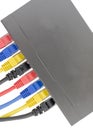 Multicolored network cables connected to router on a white Royalty Free Stock Photo