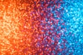 Multicolored orange red and blue shiny abstract blurred festive bokeh lights Royalty Free Stock Photo