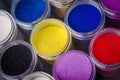 Multicolored paint in jars for makeup artistry Royalty Free Stock Photo