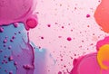 Multicolored Paint Splatter Design on Pink Background with Round Bubbles for Creative Art Projects Royalty Free Stock Photo