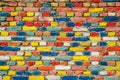 Multicolored painted bricks, exterior wall as background Royalty Free Stock Photo