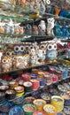 Multicolored painted ceramic oriental souvenirs in the market at in Turkey -plates, jugs, vases, figurines. Popular tourist