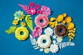 Multicolored paper donuts, flowers and leaves