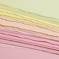 Multicolored paper layers arranged in a stack. Each sheet has a torn edge, creating Royalty Free Stock Photo