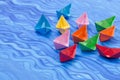 Multicolored paper origami boats