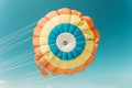 A multi-colored dome of a parachute in the sky as a background Royalty Free Stock Photo