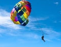 Multicolored Parasail in flight Royalty Free Stock Photo