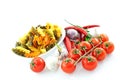 Multicolored pasta, pepper, tomato and garlic