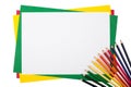 Multicolored pencils on a frame from colored paper Royalty Free Stock Photo