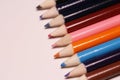 Multicolored pencils on the table. A stack of colored pencils ti Royalty Free Stock Photo