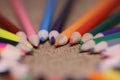 Multicolored pencils on the table. A stack of colored pencils ti Royalty Free Stock Photo