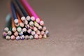 Multicolored pencils on the table. A stack of colored pencils ti Royalty Free Stock Photo
