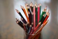 Multicolored pencils on the table. A stack of colored pencils ti Royalty Free Stock Photo