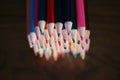 Multicolored pencils on the table. A stack of colored pencils ti Royalty Free Stock Photo