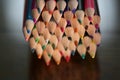 Multicolored pencils on the table. A stack of colored pencils ti Royalty Free Stock Photo